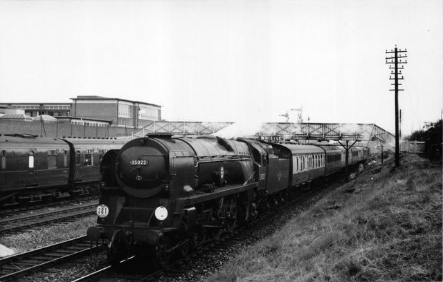 BR(S) Merchant Navy class 35022 'Holland-America Line' leaving Poole, Dorset with a Waterloo - Weymouth service on Saturday 19 Jul 1958 - J.H.W. Kent [000179]