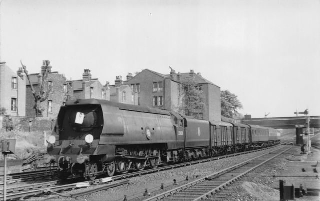BR(S) Merchant Navy class 35028 'Clan Line' at Wandsworth Road, Greater London with a Dover Marine (or Folkestone Harbour) - Victoria Boat Train on Saturday 02 Jun 1951 - J.H.W. Kent [000219]