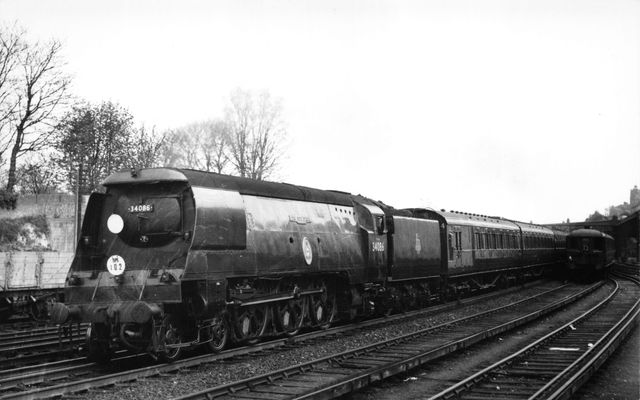 BR(S) Battle of Britain class 34086 '219 Squadron' passing Preston Park Pullman Car Works, East Sussex with the 3.31pm Brighton - Brentford Football Special on Monday 28 Apr 1958 - J.H.W. Kent [002166]