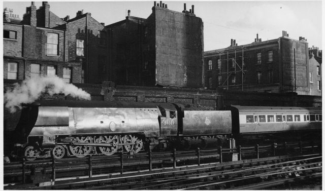 BR(S) Battle of Britain class 34089 '602 Squadron' approaching Victoria, Greater London on Saturday 22 Aug 1953 - J.H.W. Kent [002185]