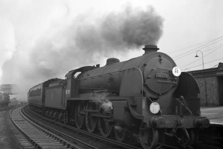 BR(S) King Arthur class 30779 'Sir Colgrevance' at Clapham Junction, Greater London with a Waterloo - Bournemouth service on Saturday 09 Sep 1950 - J.H.W. Kent [023111]