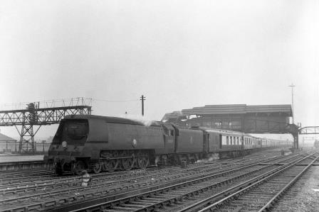 BR(S) Merchant Navy class 35029 'Ellerman Lines' at Clapham Junction, Greater London with a Bournemouth Belle empty stock arriving from Stewarts Lane on Saturday 14 Jul 1951 - J.H.W. Kent [025111]
