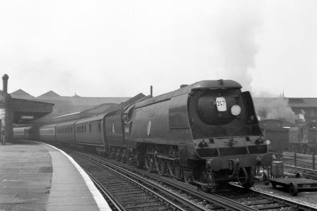BR(S) Battle of Britain class 34063 '229 Squadron' at Clapham Junction Station, Greater London with a Bournemouth? - Waterloo service on Saturday 14 Jul 1951 - J.H.W. Kent [025115]