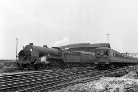 BR(S) King Arthur class 30790 'Sir Villiars' & BR(S) Class 4-SUB 4177 at Clapham Junction, Greater London with a Waterloo - Bournemouth service on Saturday 14 Jul 1951 - J.H.W. Kent [025122]