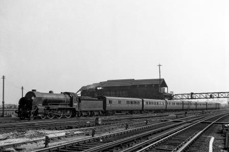 BR(S) H15 class 30487 at Clapham Junction, Greater London with a Waterloo - Basingstoke service on Saturday 21 Jul 1951 - J.H.W. Kent [025149]