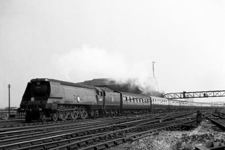 BR(S) Merchant Navy class 35015 'Rotterdam Lloyd' at Clapham Junction, Greater London with a Waterloo - West of England service on Saturday 21 Jul 1951 - J.H.W. Kent [025151]