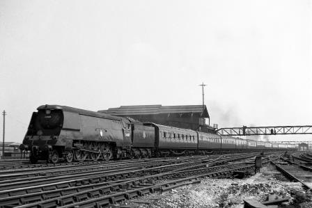 BR(S) West Country class 34009 'Lyme Regis' at Clapham Junction, Greater London with a Waterloo - West of England service on Saturday 21 Jul 1951 - J.H.W. Kent [025154]