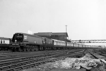 BR(S) Merchant Navy class 35018 'British India Line' at Clapham Junction, Greater London with the down "Devon Belle" on Saturday 21 Jul 1951 - J.H.W. Kent [025156]