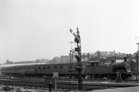 BR(S) H class 31329 at Clapham Junction, Greater London with a Kensington Olympia - Clapham Junction service on Saturday 21 Jul 1951 - J.H.W. Kent [025159]