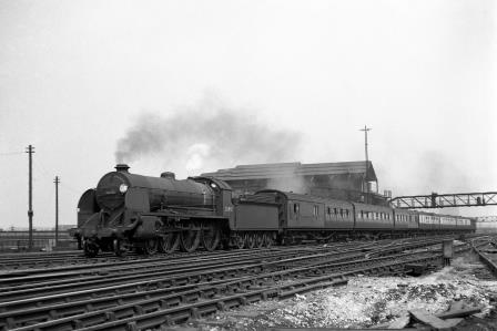 BR(S) King Arthur class 30451 'Sir Lamorak' at Clapham Junction, Greater London with a Waterloo - Basingstoke service on Saturday 21 Jul 1951 - J.H.W. Kent [025160]