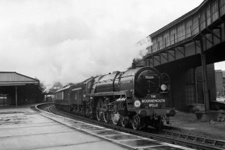BR(S) Britannia class 70009 'Alfred the Great' at Clapham Junction Station, Greater London with a down Bournemouth Belle service on Saturday 11 Aug 1951 - J.H.W. Kent [025219]