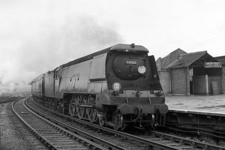BR(S) West Country class 34012 'Launceston' at Clapham Junction Station, Greater London with a Waterloo - Bournemouth service on Saturday 11 Aug 1951 - J.H.W. Kent [025220]