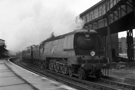 BR(S) Battle of Britain class 34049 'Anti-Aircraft Command' at Clapham Junction, Greater London with a Waterloo - West of England service on Saturday 11 Aug 1951 - J.H.W. Kent [025224]