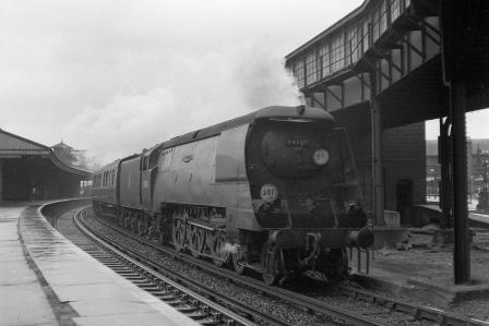 BR(S) Battle of Britain class 34110 '66 Squadron' at Clapham Junction Station, Greater London with a Waterloo - Bournemouth service on Saturday 11 Aug 1951 - J.H.W. Kent [025225]