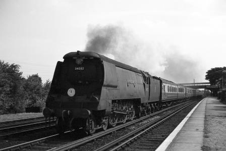 BR(S) West Country class 34032 'Camelford' at Raynes Park, Greater London with a Waterloo - West of England service on Saturday 18 Aug 1951 - J.H.W. Kent [025229]