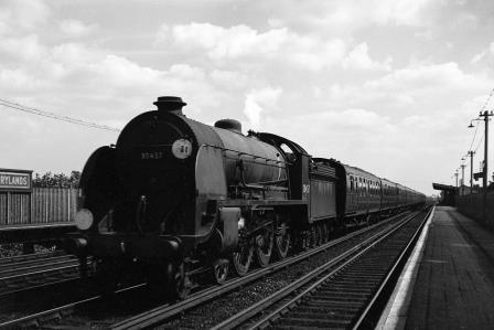 BR(S) King Arthur class 30457 'Sir Bedivere' at Berrylands, Greater London with a Waterloo - Bournemouth service on Saturday 18 Aug 1951 - J.H.W. Kent [025234]