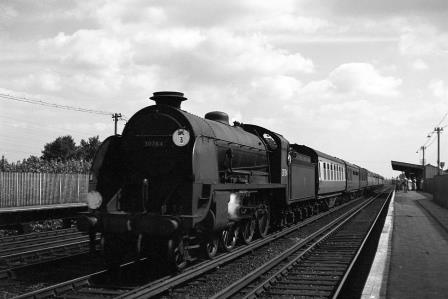 BR(S) King Arthur class 30784 'Sir Nerovens' at Berrylands, Greater London with a Waterloo - Bournemouth service on Saturday 18 Aug 1951 - J.H.W. Kent [025236]