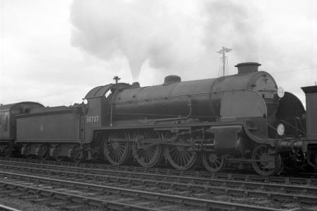 BR(S) King Arthur class 30737 'King Uther' at Eastleigh, Hampshire with a down Passenger service on Friday 24 Aug 1951 - J.H.W. Kent [025313]