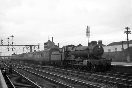 BR(S) Grange class 6802 'Bampton Grange' at Eastleigh, Hampshire with an up Passenger service on Friday 24 Aug 1951 - J.H.W. Kent [025315]