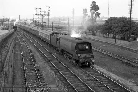 BR(S) West Country class 34107 'Blandford Forum' at Eastleigh, Hampshire with a Waterloo - Bournemouth service on Friday 24 Aug 1951 - J.H.W. Kent [025347]