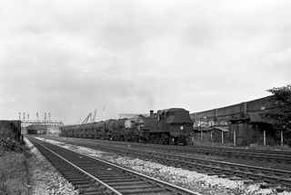 BR(M) 2MT class 41292 at Longhedge, Greater London with a Milktanks from West London line heading for Stewarts Lane on Saturday 03 Sep 1955 - J.J. Smith [040162]