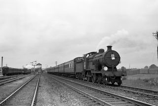 BR(S) E1 class 31497 at Paddock Wood, Kent with the 9.03am London Bridge - Headcorn service on Sunday 11 Sep 1955 - J.J. Smith [040168]