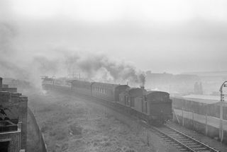BR(E) J67 class 68516 & BR(E) J69 class 68532 in Greater London with the 10.50am New Cross Gate - Colchester service on Thursday 24 Nov 1955 - J.J. Smith [040208]