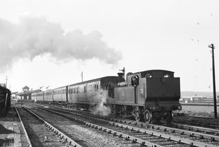 BR(S) O2 class W25 'Godshill' at Sandown, Isle of Wight with the 11.42am to Ventnor on Saturday 31 Dec 1955 - J.J. Smith [040218]