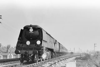 BR(S) West Country class 34046 'Braunton' at Latchmere, Greater London with a Northbound Inter Regional train (from Sussex Coast) on Saturday 10 Mar 1956 - J.J. Smith [040241]