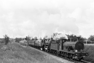 BR(S) C class 31583 & BR Std 4MT class 76054 at Hellingly, East Sussex with the 9.25am Eastbourne - Tunbridge Wells West service on Sunday 03 Jun 1956 - J.J. Smith [040407]