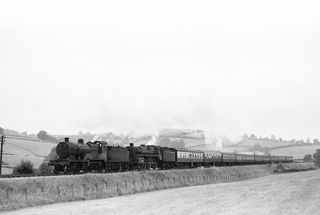 BR(M) 2P class 40563 & BR Std 5MT class 73051 with the 10.05am Bournemouth West - Cleethorpes service on Saturday 28 Jul 1956 - J.J. Smith [040566]