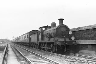 BR(S) C class 31287 at North Kent West Junction, Greater London with the 3.00pm Redhill - Blackfriars service on Tuesday 25 Sep 1956 - J.J. Smith [040677]