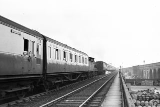 BR(S) C class 31287 at North Kent West Junction, Greater London with the 3.38pm Empty Stock Redhill - Blackheath service on Tuesday 25 Sep 1956 - J.J. Smith [040679]