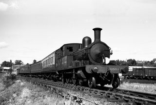 BR(S) 0415 class 30584 at Axminster, Devon with the 4.43pm Axminster - Lyme Regis, Leaving Axminster service on Thursday 15 Jun 1950 - J.J. Smith [040857]