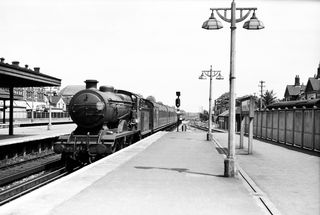 BR(S) B4X class 32052 at Woking, Surrey with the 12.19pm Waterloo - Farnborough service arriving on Saturday 08 Jul 1950 - J.J. Smith [040959]
