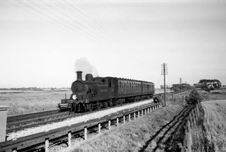 BR(S) D3 class 32385 at Polegate, East Sussex with the 6.32pm Eastbourne - Hailsham service on Friday 21 Jul 1950 - J.J. Smith [040976]