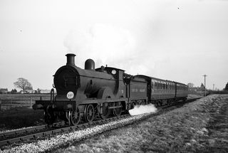 BR(S) D class 31731 at Leap Cross, East Sussex with the 4.39pm Eastbourne - Tunbridge Wells West service on Wednesday 28 Mar 1951 - J.J. Smith [041305]