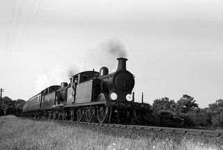 BR(S) E5 class 32405 & BR(S) I3 class 32083 at Sayerland Crossing, East Sussex with the 6.37am Eastbourne - Tunbridge Wells West service on Friday 01 Jun 1951 - J.J. Smith [041437]
