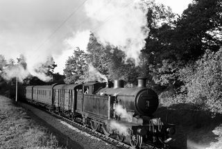 BR(S) I3 class 32028 between Rotherfield and Mark Cross and Mayfield. Argos Hill, East Sussex with the 7.00pm Tunbridge Wells West - Eastbourne service on Thursday 07 Jun 1951 - J.J. Smith [041464]