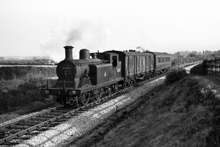 BR(S) D3 class 32385 south of Hailsham, East Sussex with the 6.32pm Eastbourne - Hailsham service on Friday 06 Jul 1951 - J.J. Smith [042421]