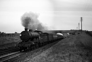 BR(S) Brighton Atlantic class 32425 'Trevose Head' at Ditchling Common, East Sussex with the 5.58pm Newhaven Harbour - Victoria service on Sunday 08 Jul 1951 - J.J. Smith [042430]