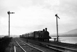 55 at Greenore, Ireland with the 1.33pm Newry - Greenore service on Thursday 27 Sep 1951 - J.J. Smith [042630]