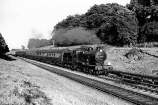 BR(S) L1 class 31787 at Folkington, East Sussex with the 7.03pm Excursion Eastbourne - Gidea Park on Sunday 29 Jun 1952 - J.J. Smith [042939]