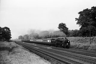 BR(S) U1 class 31896 in West Sussex with the 10.40am Birmingham - Hastings service on Saturday 26 Jul 1952 - J.J. Smith [042979]