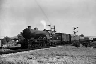 BR(S) Brighton Atlantic class 32426 'St. Alban's Head' at Southerham, East Sussex with the 4.52pm Newhaven - Victoria service on Sunday 24 Aug 1952 - J.J. Smith [043051]