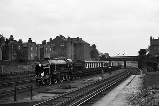 BR(S) Schools class 30915 'Brighton' at Wandsworth Road, Greater London with the 2.30pm Special Tattenham Corner - Stewarts Lane on Saturday 06 Jun 1953 - J.J. Smith [043278]