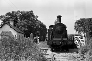 SLNCR Lough class 'Lough Gill' at Ballintogher, Ireland with the 9.45am Sligo - Enniskillen Freight on Wednesday 01 Jul 1953 - J.J. Smith [043431]