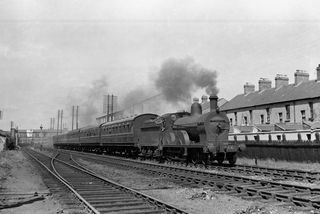 25 between Tate's Avenue bridge and Adelaide Shed, Ireland with the 3.10pm Belfast - Cavan service on Saturday 04 Jul 1953 - J.J. Smith [043463]
