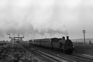 BR(S) R class 31671 at Allhallows, Kent with the 6.15pm Allhallows - Gravesend service on Bank Holiday Monday 03 Aug 1953 - J.J. Smith [043503]