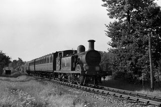 BR(S) D3 class 32390 at Bramley and Wonersh, Surrey with the 6.07pm Guildford - Horsham service on Friday 04 Jun 1954 - J.J. Smith [043789]